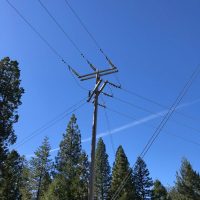 PGE-Kortik Dbl deadend turn angle gray on wood pole far